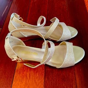 Gold strappy 1.5” wedge heel.
